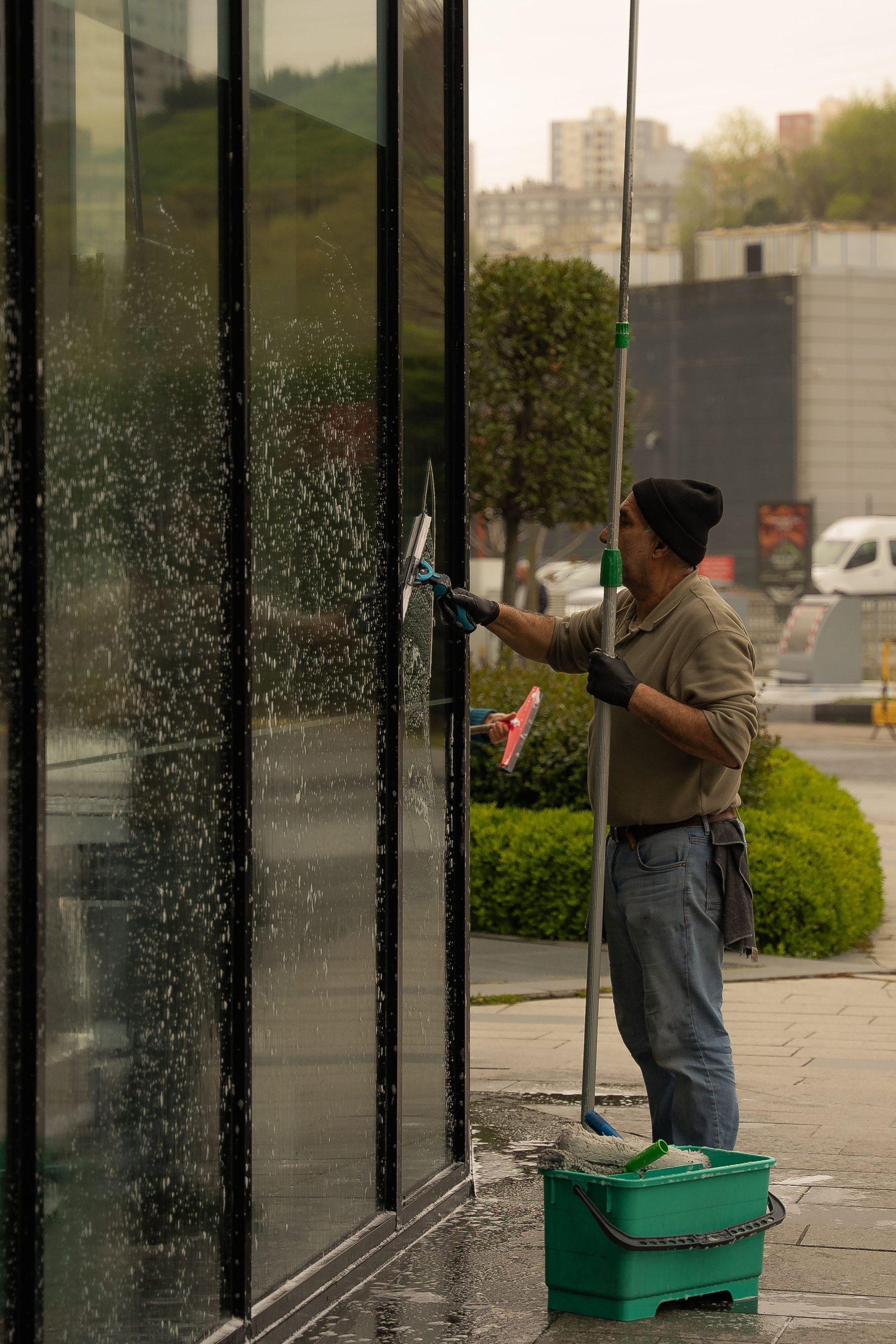 Window cleaner working on exterior glass